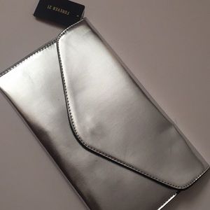 Silver metallic envelope clutch